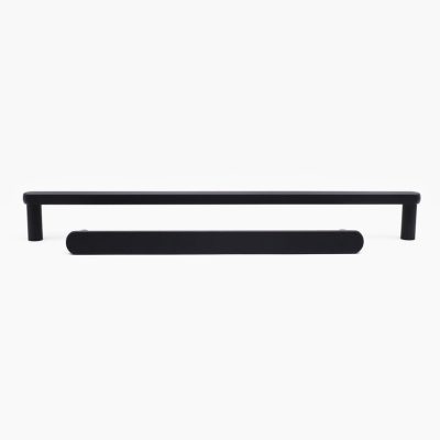 Satin brass dishwasher appliance pull on white shaker drawers and cabinets in the kitchen